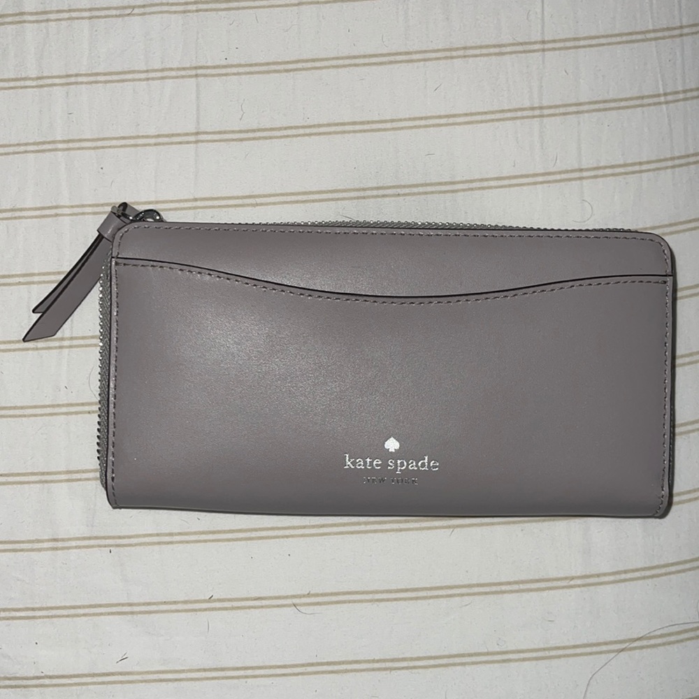 Brand new never used grey Kate spade leather wallet
